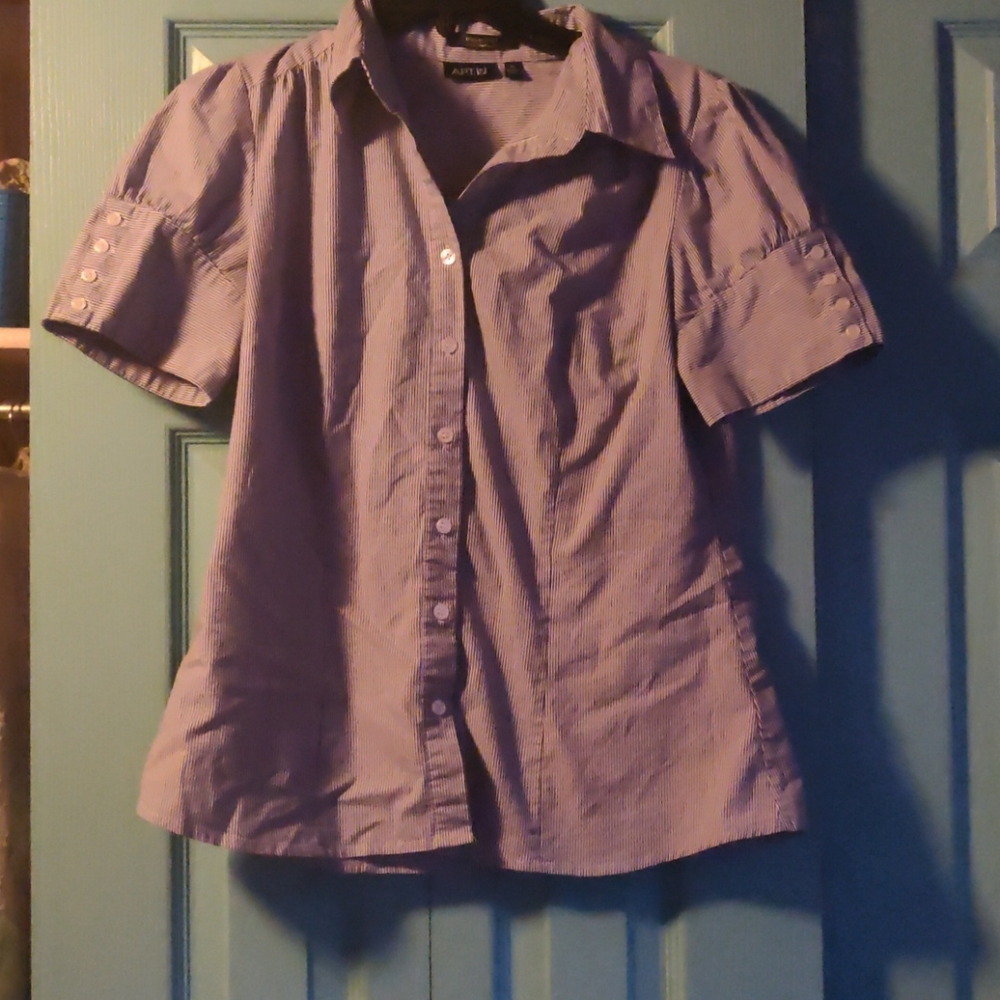 Apt.9 Essential button up top